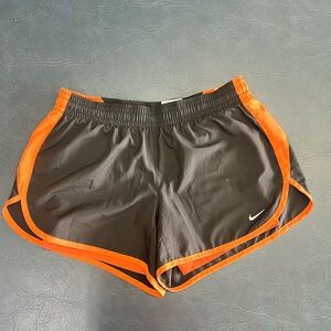 Nike Black and Orange Athletic Shorts with Curved Hem